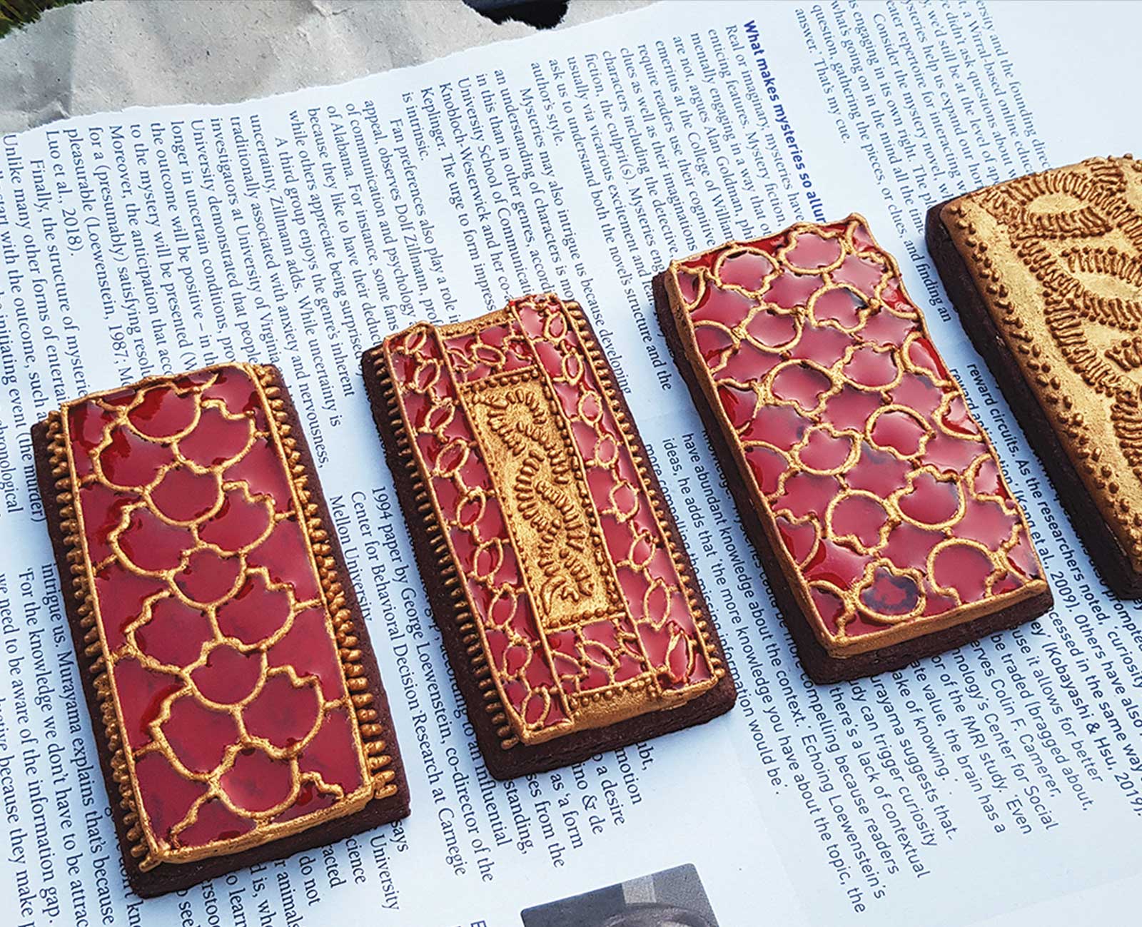 Shakespeare scholar Ella Hawkins bakes and designs intricately decorated cookies (or biscuits) that take a page from antiquarian books and medieval manuscripts.