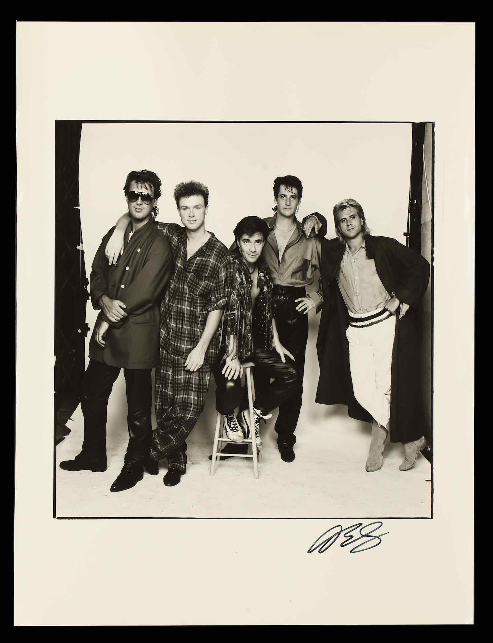 The Who (signed on reverse by Roger Daltrey, Pete Townshend, John Entwistle and Kenny Jones)